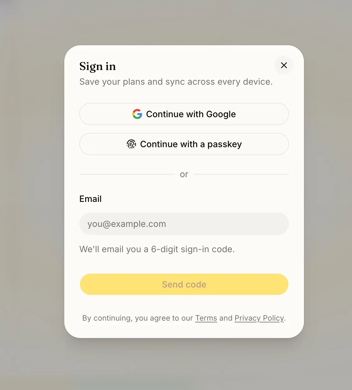 The Reassign sign-in dialog. Continue with Google and Continue with a passkey sit at the top, then a divider reading 'or', then an email field with the note that a 6-digit sign-in code will be emailed, and a Send code button.