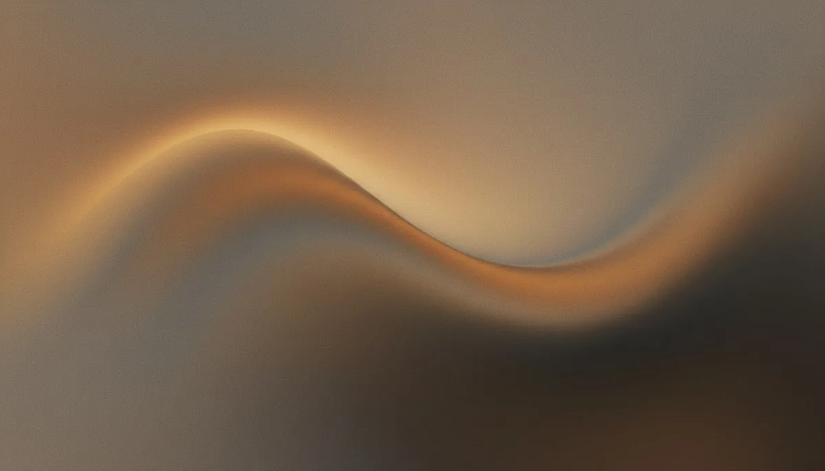 A muted mesh gradient arcs warmly from amber-gold in the upper left through grayed clay tones to deep charcoal shadows in the lower right, evoking the rise and slow fade of a day's energy curve.