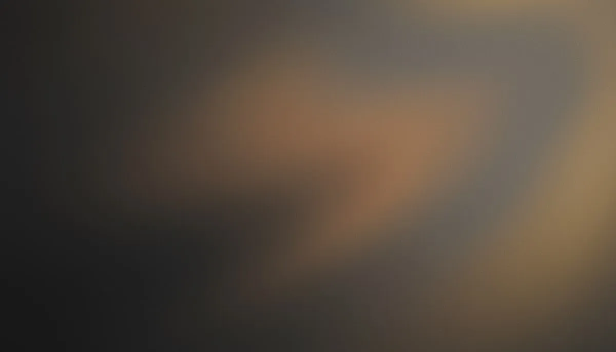 A dim, evening-toned mesh gradient drifts from deep charcoal and warm taupe into a soft muted amber bloom at the upper center, with a faint breath of grayed burnt orange dissolving toward the right, all under heavy analog film grain.